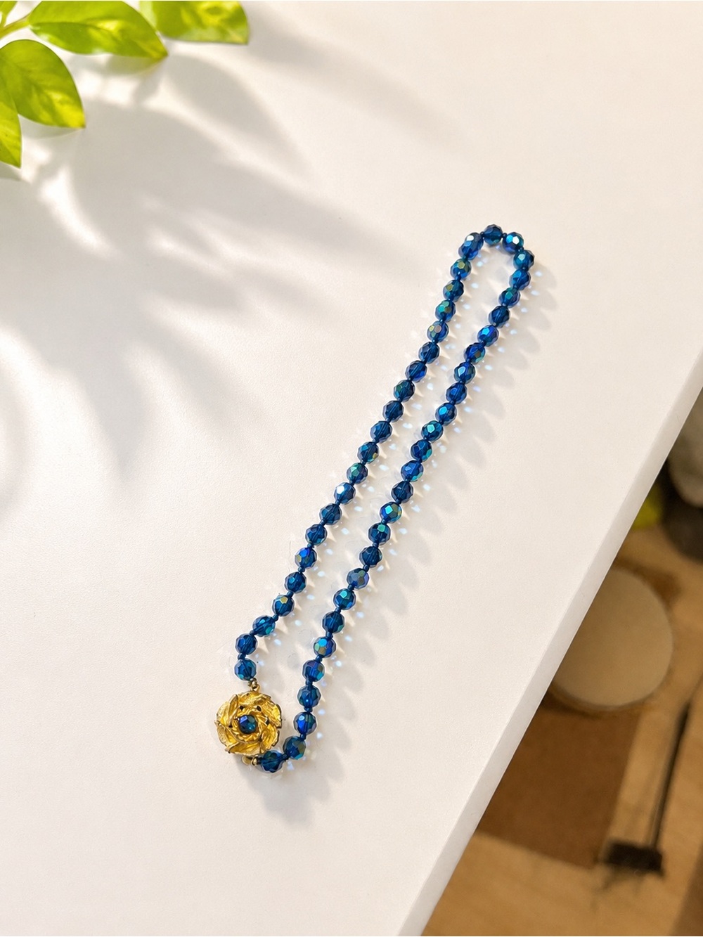 Blue Crystal Bead Necklace with Gold Flower Clasp
